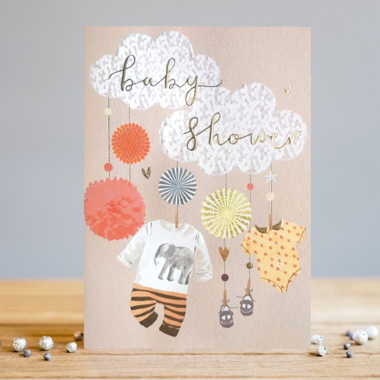 A gorgeous Baby Shower card from card designer Louise Tiler. The card has 2 cute clouds with the words Baby Shower embossed and foiled. There are images of hanging decorations and baby clothes hanging from the clouds.