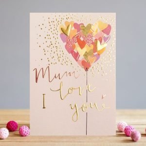 A fabulous card with a lovely pink background colour and an image of a heart shaped colourful balloon, which has been embossed and finished off with a gold foil effect, and the words Mum I Love You printed on them.