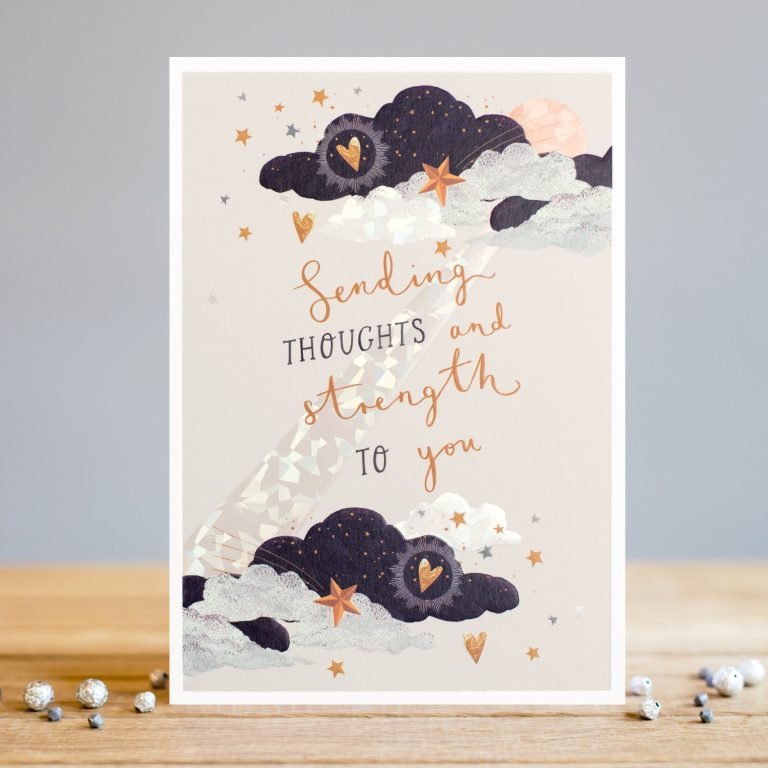A lovely Thinking of You card from Louise Tiler . A grey background with and image of clouds, hearts and stars all over it and the words 'Sending Thoughts and Strength to you embossed foiled and printed on it.