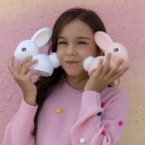 Pink bunny led night light with a fluffy white tail. Battery operated, 15 minute timer option. Colour changing