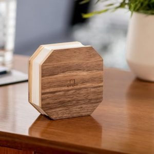 A portable rechargable lamp shaped like an accordion. With walnut wood octagonal ends and white tyvek pleated paper. pull the light to light up.