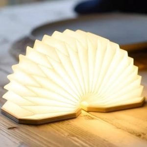 A portable rechargable lamp shaped like an accordion. With walnut wood octagonal ends and white tyvek pleated paper. pull the light to light up.