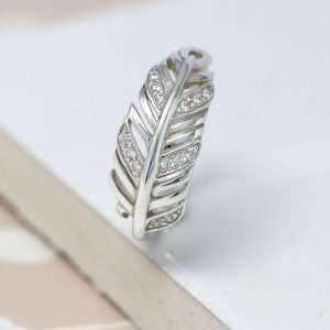 A sterling silver feather ring with cubic zirconia stones to add a bit of sparkle