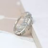A sterling silver feather ring with cubic zirconia stones to add a bit of sparkle