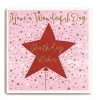 A square card with a pink background and a large red star shaped balloon in the centre of it. The Words Have a Wonderful day are embossed and printed in gold shimmer effect above the balloon and the words Birthday wishes in the centre of the balloon.