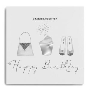 A white square card with images of a handbag, a cupcake and some shoes printed on it which have been printed in grey and silver and finished off with little diamantes. The words Granddaughter Happy Birthday are printed on the card.