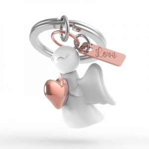 A white angel with a rose gold heart made from solid resin coloured chrome, a rose gold heart and has a tag on her side that says love
