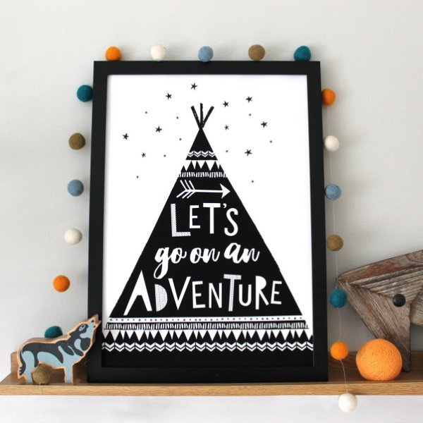 A black and white print with an image of a tent and the words Lets go on an adventure printed on it.