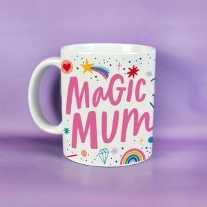A colourful mug with the words Magic Mum printed on it and rainbows and stars all over it. on the back of the mug are the words 'Every little thing you do is magic'.