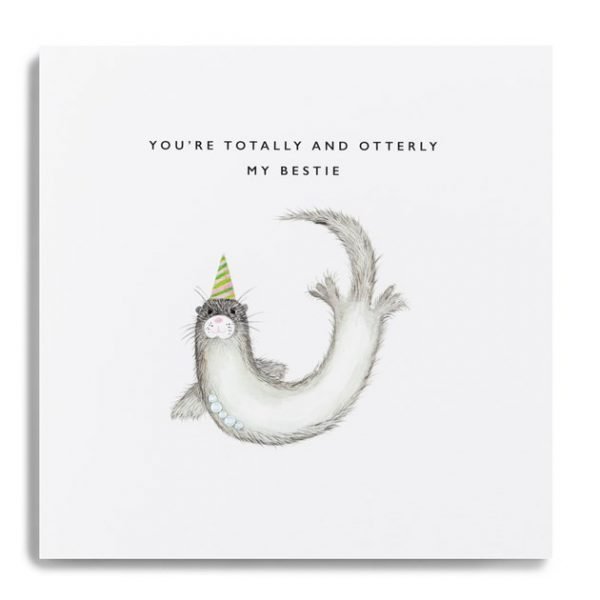 A white square card with an image of a cute otter with a party hat on which has been finished with a couple of little diamante jewels on it. The wording Totally and Otterly My Bestie are printed above the otter image.