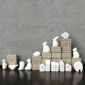A range of matchbox keepsakes with a sentiment on the front and a white porcelain trinket