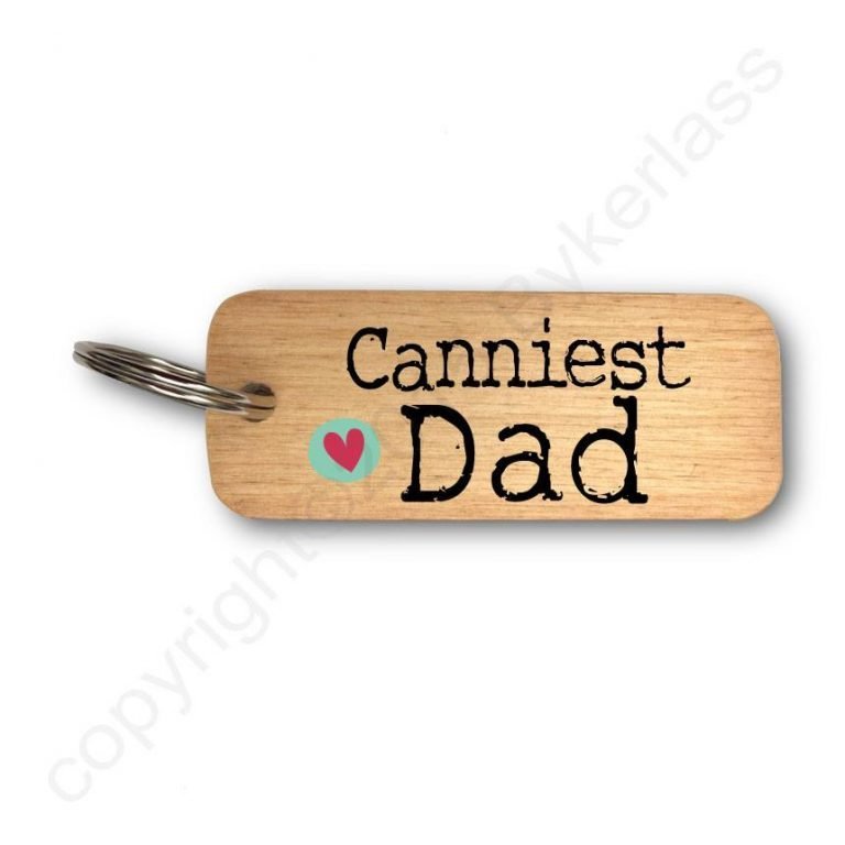A wooden keyring with the words Canniests Dad printed on it.