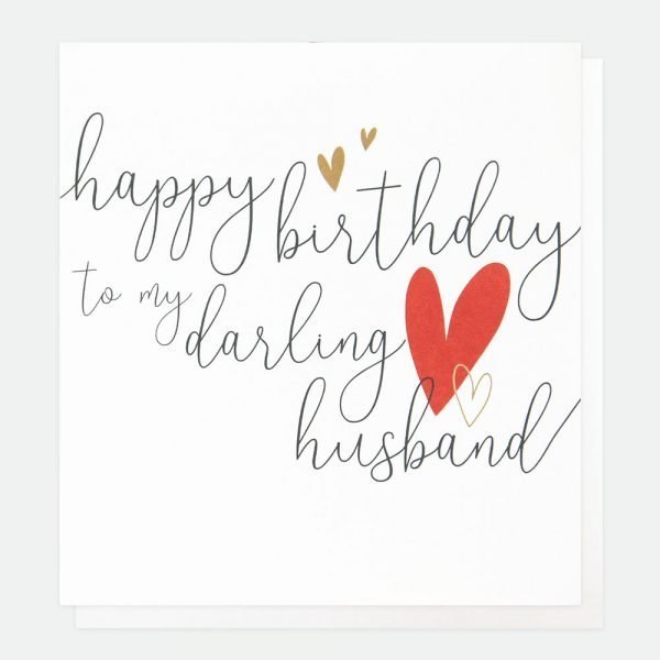 a card with happy birthday to my darling husband written on the front in scrolly handwriting and a big red heart and 2 small gold foil hearts