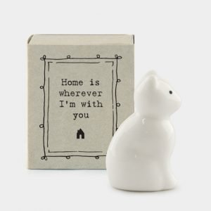 A sweet little ceramic cat in a little matchbox and the words Home is wherever I'm with you printed on it.