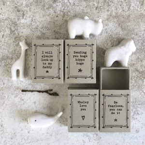 A sweet little lion ceramic keepsake in a matchbox with the words Be Fearless you can do it printed on it.