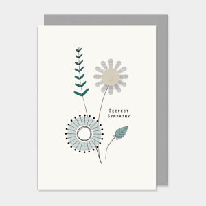 A gorgeous floral card design with a little wooden flower on it and the words Deepest Sympathy printed on it.