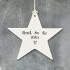 A lovely ceramic star hanging keepsake with the words Reach for the stars printed on it