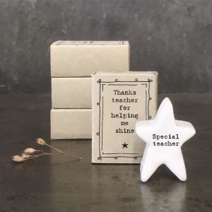A cute little ceramic star keepsake in a mathcbox with the words Thanks teacher for helping me shine printed on it and Special teacher printed on the star