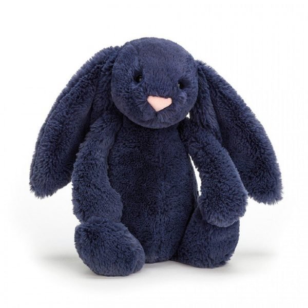 A small cute navy blue bunny with floppy ears and a pink button nose