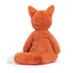 A sweet and very soft ginger fox with a long bushy tail and pointy ears.