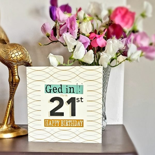 A geordie 21st birthday card with a geometric design in cream and mustard with teal and black. Ged in#!! 21st Birthday