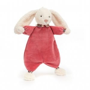 A pink velvety new baby soother with a bunny head on it from Jellycat.