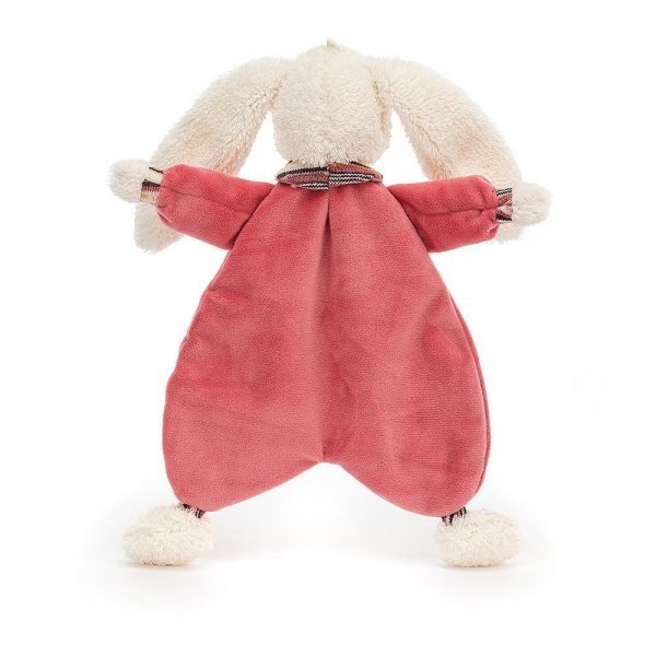 A pink velvety new baby soother with a bunny head on it from Jellycat.