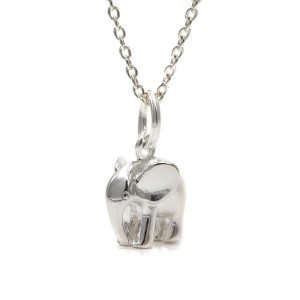 A sterling silver elephant necklace on a fine chain with a charm in the shape of an elephant.