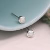 A lovely pair of sterling silver round stud earrings with an iridescent opal setting.