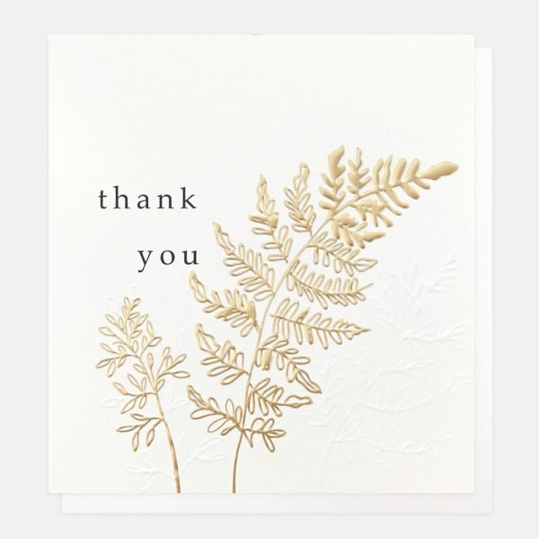 A thank you card with a gold foil leaf with thank you