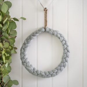 Grey Wool Chaplet Round Wreath. A Grey wool plated circular chaplet with rope hanger. Geat for hanging on doors or walls