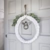 Ivory Wool Chaplet Round Wreath. A ivory wool plated circular chaplet with rope hanger. Geat for hanging on doors or walls