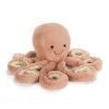 Odell octopus is a sweet soft furry peach coloured octopus cuddly toy with long tentacles with corded underside. She has lovely dark eyes and a sweet little smile.