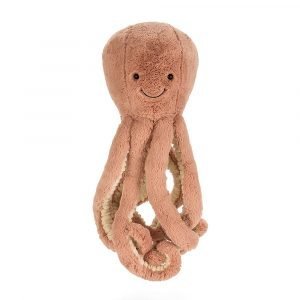 Odell octopus is a sweet soft furry peach coloured octopus cuddly toy with long tentacles with corded underside. She has lovely dark eyes and a sweet little smile.