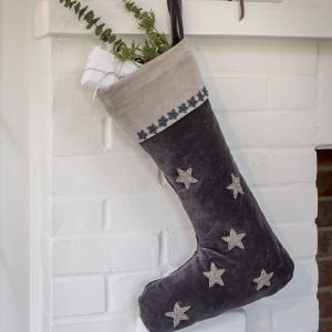 A midnight grey velvet Christmas stocking with embroidered silver bead stars