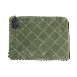 A quilted velvet tablet cover with internal padding, a zip fastening and tassel.