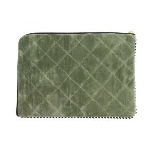 A quilted velvet tablet cover with internal padding, a zip fastening and tassel.