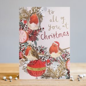 A wonderful christmas card with an image of a festive twig with 2 robins sitting on it. The words to all of you at Christmas are printed on the card.