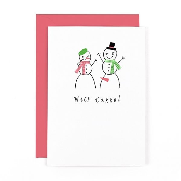 A cheeky Christmas card with a cartoon drawing of a snowman and woman The snowman has a cheekily placed carrot. Nice Carrot!