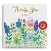 A card with lots of brightly coloured flowers and Thank You So Much in gold foil letters