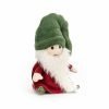 A cute cuddly gnome with a long white beard and a soft red coat. Nisse Gnome noel has a lovely green furry hat.