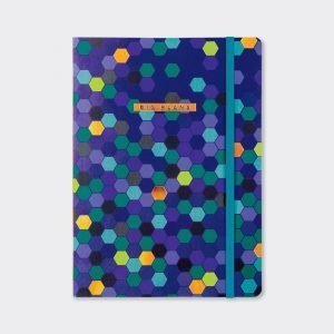 A blue patterned A5 notebook with different coloured hexagon shapes on it. There is an elasticated ribbon to keep the book together.