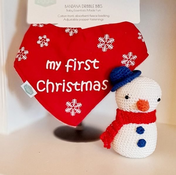 A red soft absorbent cotton bandana dribble bib with white snowflakes and my first christmas