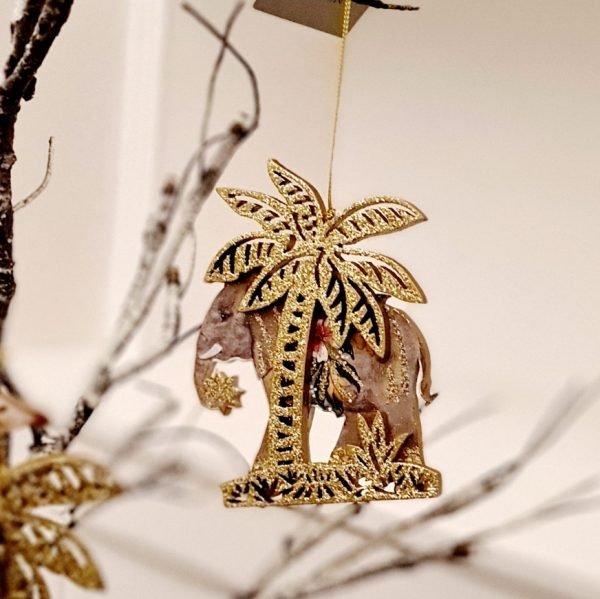 Wooden elephant decoration with a vintage print and a stunning gold palm tree