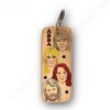 A wooden key ring with a caricature of each member of the super group ABBA