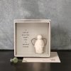 A lovely little wooden angel presented in a cardboard box with the words A Little Guardian Angel for a special friend printed on it.