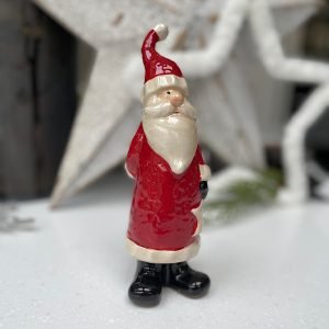 A gorgeous ceramic standing santa decoration available in 3 different sizes