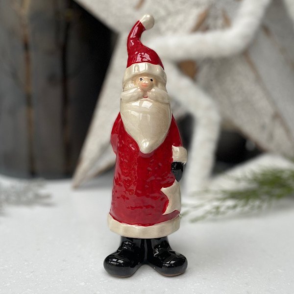 A gorgeous ceramic standing santa decoration available in 3 different sizes