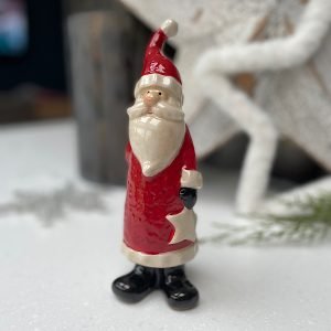A gorgeous ceramic standing santa decoration available in 3 different sizes