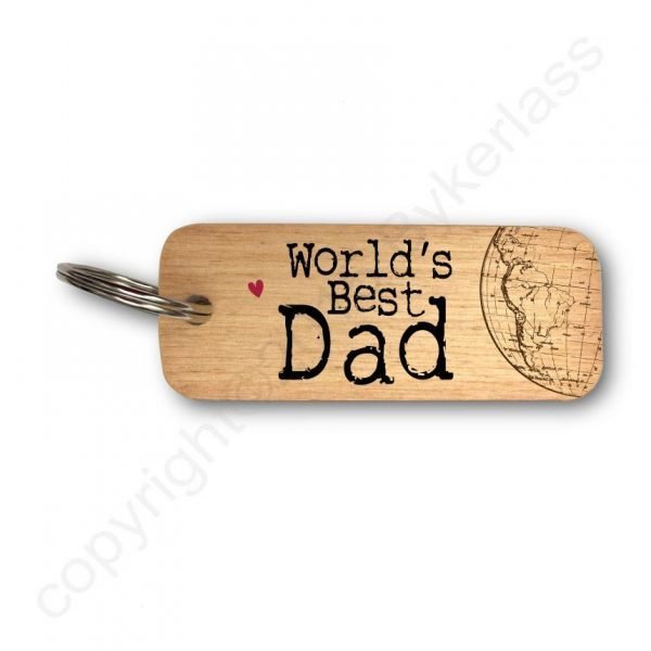 A wooden key ring printed with a design that reads World's Best Dad